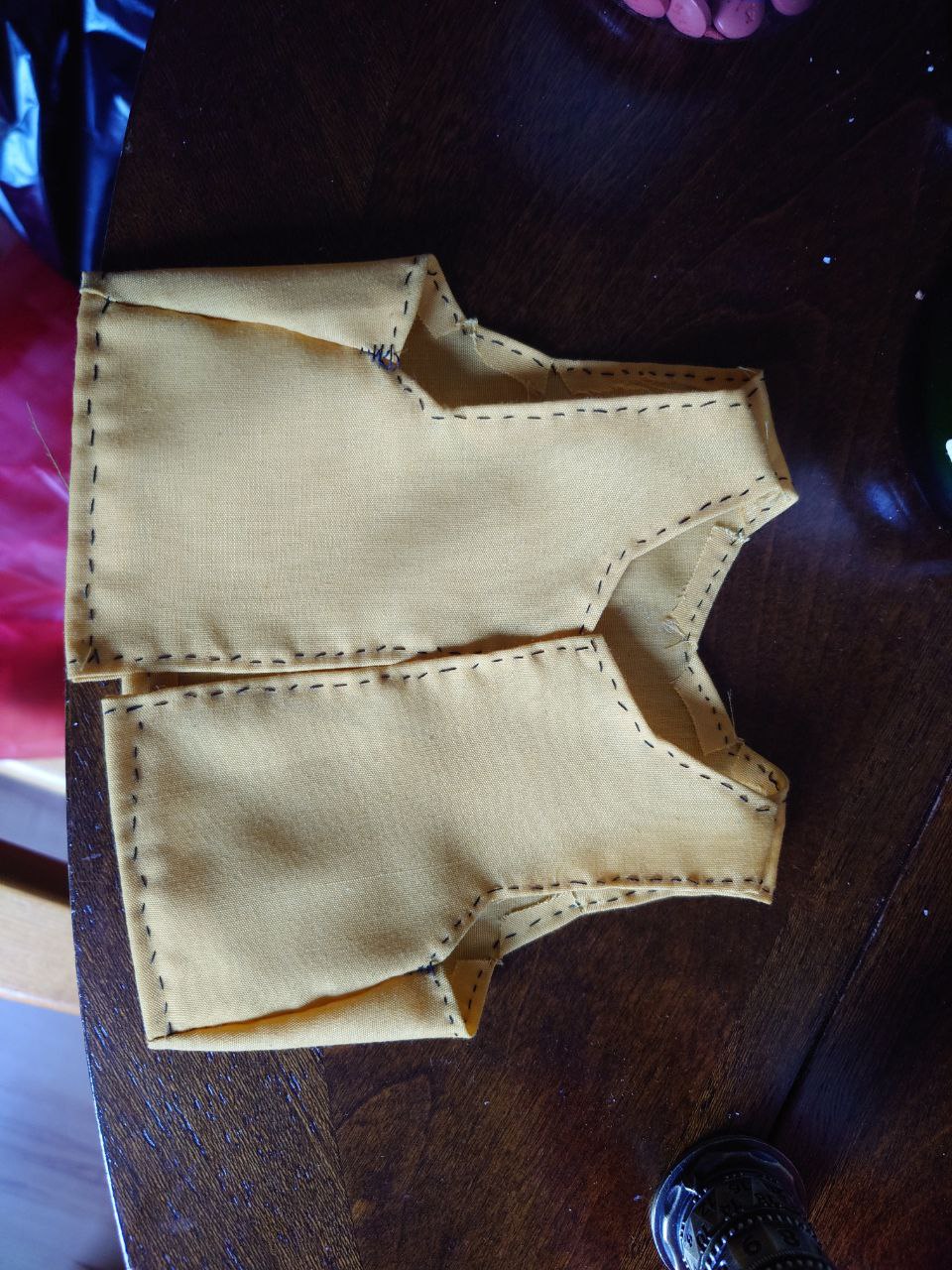 the same vest, but not being worn. It is about 5 inches tall.